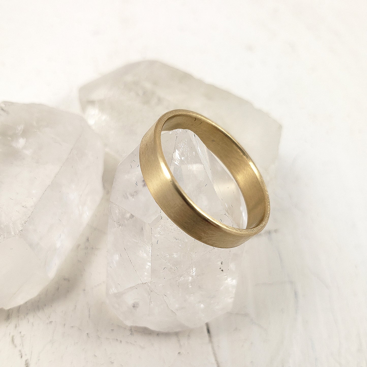 Solid 14k gold wedding band in a brushed finish