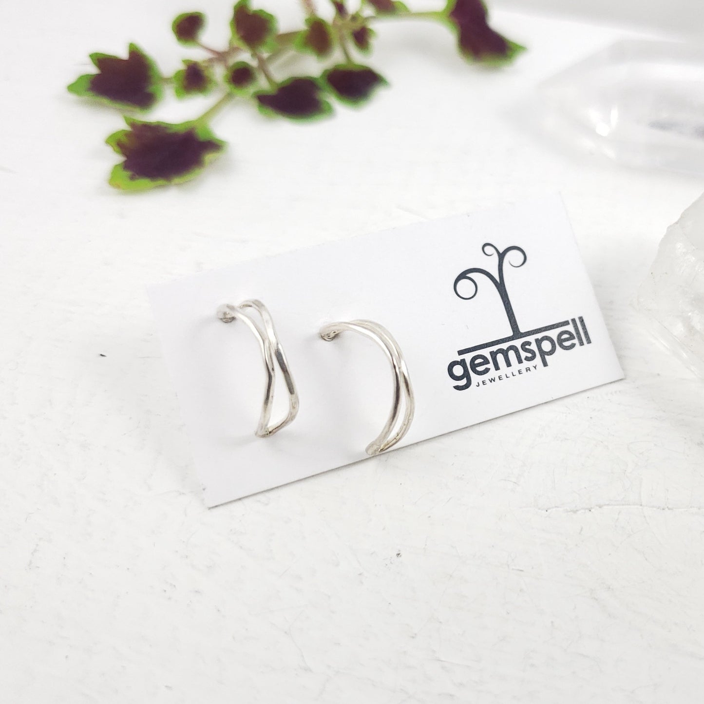 Pendientes de medio aro facetados de plata