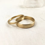 Set of solid gold wedding bands, 10k, 14k and 18 k yellow gold